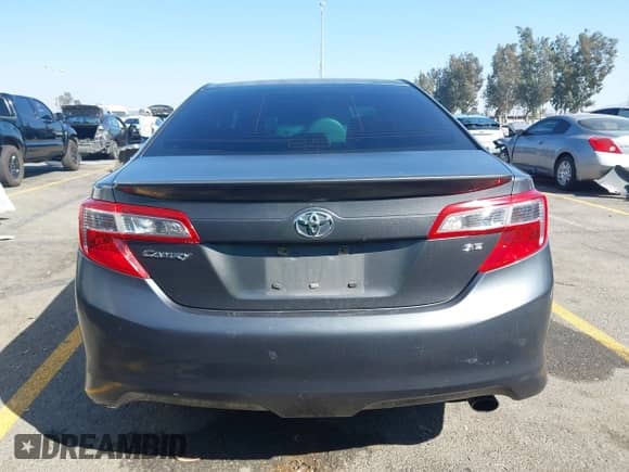 2014 Toyota Camry SE with VIN 4T1BF1FK0EU305189, listed as a IAAI auction lot 43398662 with 207,493 mi miles and . Bid and sale history available at DreamBid. Image 16.