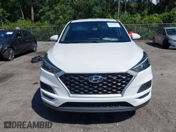 2021 Hyundai Tucson SE with VIN KM8J23A41MU318897, listed as a IAAI auction lot 43233832 with 112,924 mi miles and . Bid and sale history available at DreamBid. Image 11.