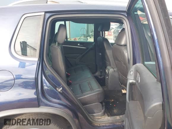 2015 Volkswagen Tiguan S with VIN WVGAV7AX7FW093868, listed as a IAAI auction lot 43143969 with 116,252 mi miles and . Bid and sale history available at DreamBid. Image 8.