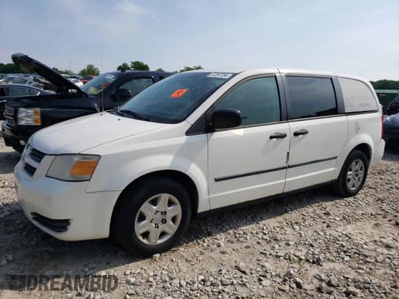 2009 Dodge Caravan with VIN 1D4HN11E79B508183, listed as a Copart auction lot 57297734 with 135,651 mi miles and Salvage title. Bid and sale history available at DreamBid. Image 1.
