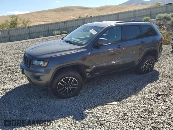 2019 Jeep Grand Cherokee Trailhawk with VIN 1C4RJFLG0KC553944, listed as a Copart auction lot 68022805 with 103,477 mi miles and Salvage title. Bid and sale history available at DreamBid. Image 1.