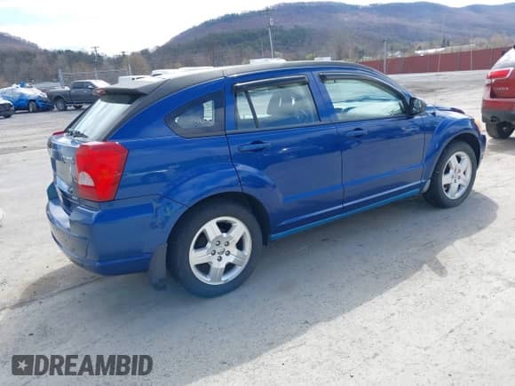 2009 Dodge Caliber SXT with VIN 1B3HB48C89D125855, listed as a IAAI auction lot 41930478 with 66,403 mi miles and . Bid and sale history available at DreamBid. Image 4.
