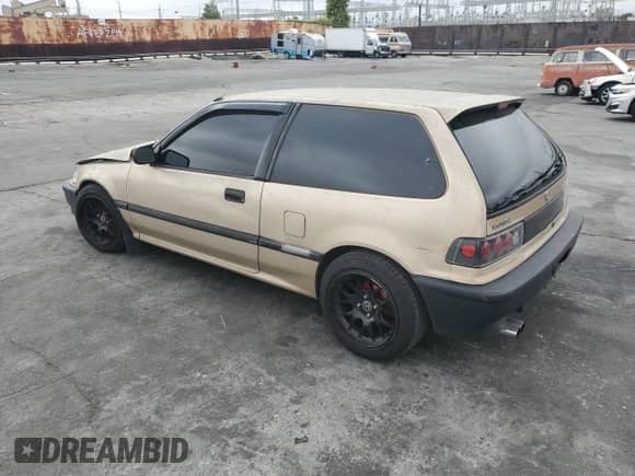 1990 Honda Civic with VIN 2HGED6343LH555344, listed as a Copart auction lot 51232765 with 217,533 mi miles and Salvage title. Bid and sale history available at DreamBid. Image 2.
