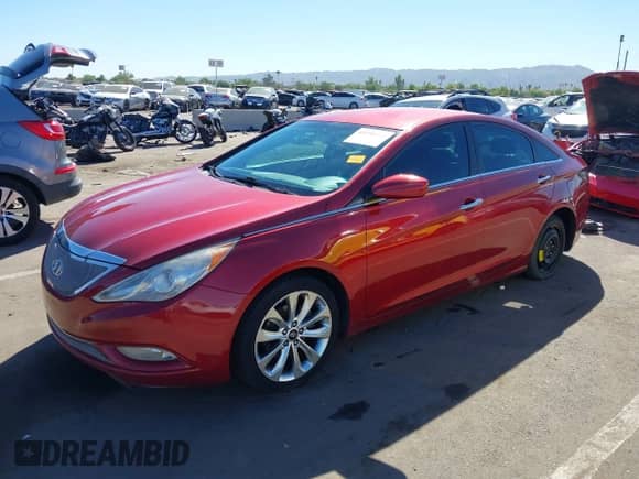 2013 Hyundai Sonata SE z VIN 5NPEC4ACXDH777372, wystawiony jako IAAI lot #43390082 z przebiegiem 107 207 mil mil oraz . Historia ofert i sprzedaży dostępna na DreamBid. Obrazek 17.