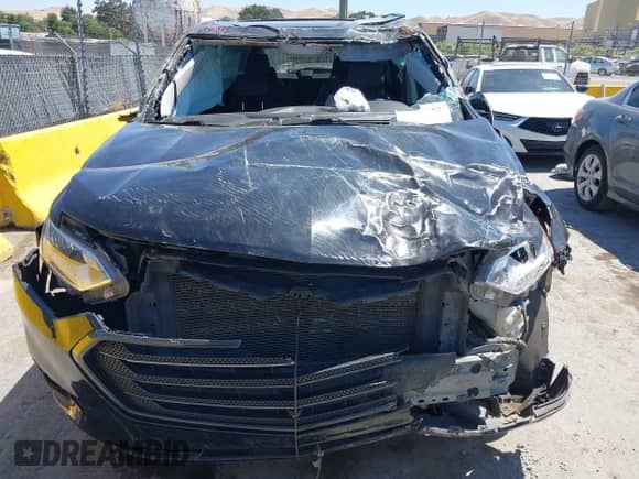 2020 Chevrolet Traverse Premier z VIN 1GNERKKW4LJ282612, wystawiony jako IAAI lot #42313667 z przebiegiem 90 922 mil mil oraz . Historia ofert i sprzedaży dostępna na DreamBid. Obrazek 13.