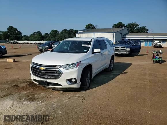 2018 Chevrolet Traverse Premier с VIN 1GNERKKW5JJ271213, выставлен на аукционе Copart как лот 81551465 с пробегом 143 278 миль миль и Списание • Salvage title. История ставок и продаж доступна на DreamBid. Изображение 14.