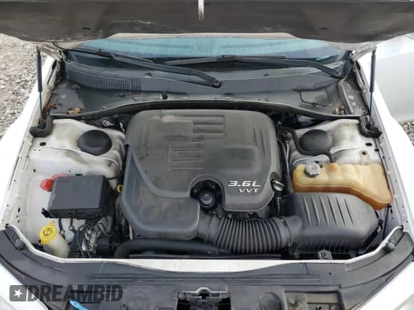 2012 Chrysler 300 Limited z VIN 2C3CCACG7CH279681, wystawiony jako Copart lot #83852145 z przebiegiem 105 752 mil mil oraz Szkoda całkowita • Salvage title. Historia ofert i sprzedaży dostępna na DreamBid. Obrazek 11.