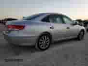 2006 Hyundai Azera SE с VIN KMHFC46F56A083928, выставлен на аукционе Copart как лот 77825994 с пробегом 88 461 миль миль и Чистый • Clean title. История ставок и продаж доступна на DreamBid. Изображение 3.