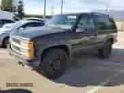 1997 Chevrolet Tahoe с VIN 3GNEK18R6VG156112, выставлен на аукционе Copart как лот 81587144 с пробегом 243 961 миль миль и На запчасти • Non repairable. История ставок и продаж доступна на DreamBid. Изображение 1.