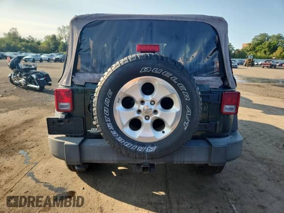 2012 Jeep Wrangler Sport with VIN 1C4AJWAGXCL110511, listed as a Copart auction lot 80013445 with 171,677 mi miles and Clean title. Bid and sale history available at DreamBid. Image 6.
