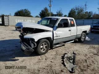 1998 Dodge 1500 with VIN 3B7HC12Y8WG217402, listed as a Copart auction lot 85560594 with 247,896 mi miles and Salvage title. Bid and sale history available at DreamBid. Image 1.