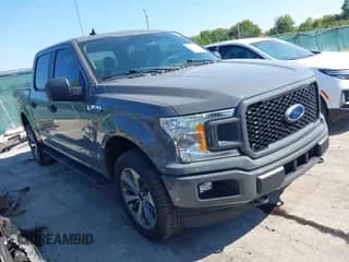 2020 Ford F-150 XLT with VIN 1FTEW1EP7LFA93407, listed as a IAAI auction lot 43223045 with 74,248 mi miles and . Bid and sale history available at DreamBid. Image 1.