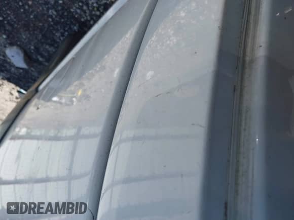 1998 GMC Sierra 1500 with VIN 1GTEC14W1WZ521296, listed as a IAAI auction lot 42232035 with 198,485 mi miles and . Bid and sale history available at DreamBid. Image 6.