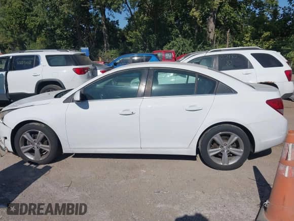 2014 Chevrolet Cruze 2LT with VIN 1G1PE5SB6E7329532, listed as a IAAI auction lot 43120171 with 223,043 mi miles and . Bid and sale history available at DreamBid. Image 14.