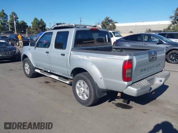 2003 Nissan Frontier SE with VIN 1N6ED27T33C422821, listed as a IAAI auction lot 43573760 with 264,856 mi miles and . Bid and sale history available at DreamBid. Image 3.