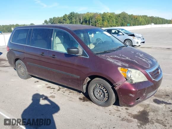 2010 Honda Odyssey LX with VIN 5FNRL3H25AB079528, listed as a IAAI auction lot 43390658 with 242,152 mi miles and . Bid and sale history available at DreamBid. Image 1.