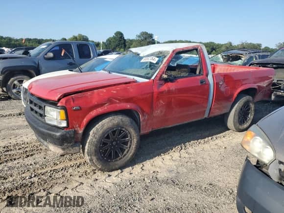 1994 Dodge Dakota z VIN 1B7FL26GRWQ111468, wystawiony jako Copart lot #68062354 z przebiegiem 249 839 mil mil oraz Szkoda całkowita • Salvage title. Historia ofert i sprzedaży dostępna na DreamBid. Obrazek 1.