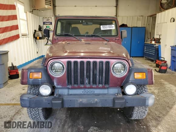 2001 Jeep Wrangler Sahara z VIN 1J4FA59S11P334534, wystawiony jako Copart lot #90651005 z przebiegiem 155 822 mil mil oraz Czysty tytuł • Clean title. Historia ofert i sprzedaży dostępna na DreamBid. Obrazek 5.