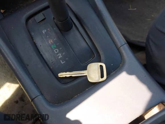 1999 Toyota Camry LE z VIN JT2BG22K4X0271967, wystawiony jako IAAI lot #42464880 z przebiegiem 200 314 mil mil oraz . Historia ofert i sprzedaży dostępna na DreamBid. Obrazek 11.