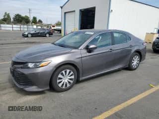 2019 Toyota Camry Hybrid LE с VIN 4T1B31HK3KU006667, выставлен на аукционе Copart как лот 80162455 с пробегом 81 491 миль миль и Списание • Salvage title. История ставок и продаж доступна на DreamBid. Изображение 1.