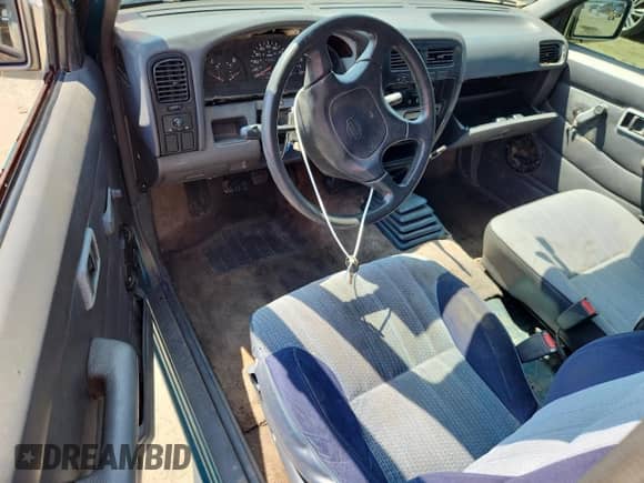 1995 Nissan Frontier with VIN 1N6SD11S3SC358078, listed as a Copart auction lot 71859815 with 118,833 mi miles and Salvage title. Bid and sale history available at DreamBid. Image 8.