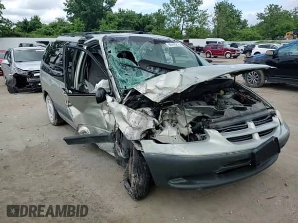 1999 Dodge Caravan SE with VIN 1B4GP45G7XB529075, listed as a Copart auction lot 60448215 with Not provided miles and Salvage title. Bid and sale history available at DreamBid. Image 14.