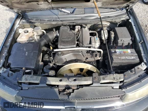 2003 Chevrolet TrailBlazer LT с VIN 1GNDS13S732247806, выставлен на аукционе Copart как лот 59489595 с пробегом 299 638 миль миль и Списание • Salvage title. История ставок и продаж доступна на DreamBid. Изображение 12.