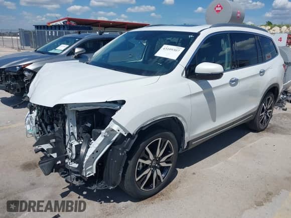 2022 Honda Pilot Touring 8-Passenger с VIN 5FNYF5H91NB014564, выставлен на аукционе IAAI как лот 43109307 с пробегом 38 212 миль миль и . История ставок и продаж доступна на DreamBid. Изображение 21.