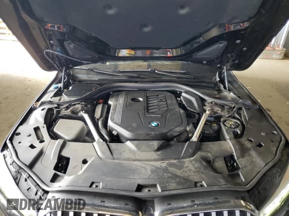 2022 BMW 7 Series 740i z VIN WBA7T2C03NCK24489, wystawiony jako Copart lot #61241055 z przebiegiem 34 678 mil mil oraz Szkoda całkowita • Salvage title. Historia ofert i sprzedaży dostępna na DreamBid. Obrazek 11.