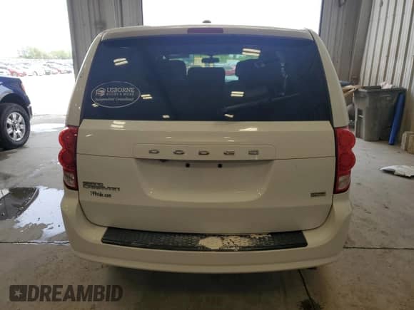 2018 Dodge Grand Caravan SE z VIN 2C4RDGBG4JR200580, wystawiony jako Copart lot #58362815 z przebiegiem 150 017 mil mil oraz Szkoda całkowita • Salvage title. Historia ofert i sprzedaży dostępna na DreamBid. Obrazek 6.