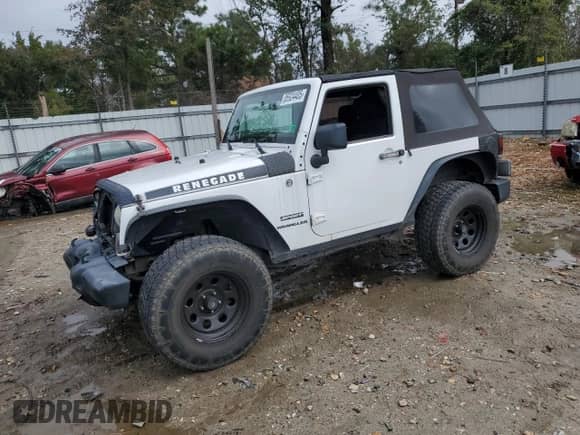2012 Jeep Wrangler Sport with VIN 1C4AJWAG6CL272068, listed as a Copart auction lot 85924405 with 145,088 mi miles and Clean title. Bid and sale history available at DreamBid. Image 1.