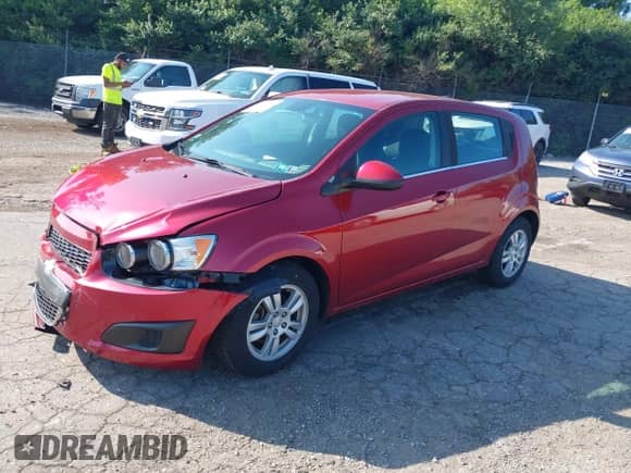 2013 Chevrolet Sonic LT with VIN 1G1JC6SBXD4249992, listed as a IAAI auction lot 42667093 with 53,007 mi miles and . Bid and sale history available at DreamBid. Image 2.