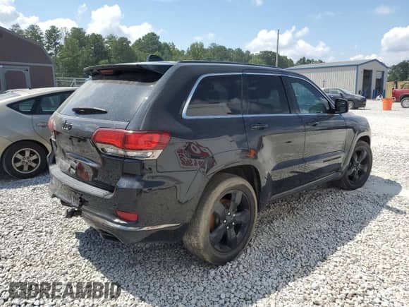 2015 Jeep Grand Cherokee Overland z VIN 1C4RJECG4FC242615, wystawiony jako Copart lot #63758835 z przebiegiem 95 303 mil mil oraz Szkoda całkowita • Salvage title. Historia ofert i sprzedaży dostępna na DreamBid. Obrazek 3.