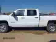 2015 Chevrolet Silverado 2500HD Work Truck z VIN 1GC1KUE81FF569806, wystawiony jako IAAI lot #42896050 z przebiegiem 160 673 mil mil oraz . Historia ofert i sprzedaży dostępna na DreamBid. Obrazek 15.