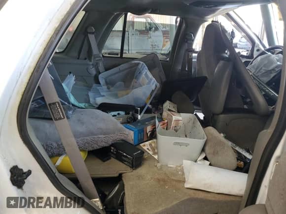 1999 Chevrolet Blazer LT z VIN 1GNDT13W4X2225140, wystawiony jako Copart lot #64834825 z przebiegiem Nie podano mil oraz Nie do naprawy • Non repairable. Historia ofert i sprzedaży dostępna na DreamBid. Obrazek 11.