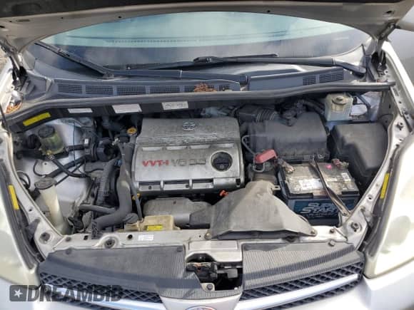 2005 Toyota Sienna XLE z VIN 5TDBA22CX5S051132, wystawiony jako Copart lot #84712135 z przebiegiem 179 807 mil mil oraz Szkoda całkowita • Salvage title. Historia ofert i sprzedaży dostępna na DreamBid. Obrazek 12.