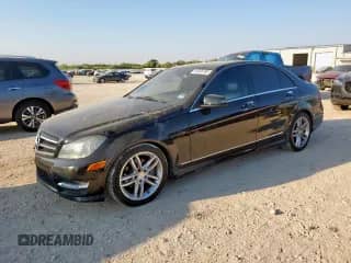 2014 Mercedes-Benz C 250 Sport with VIN WDDGF4HB9EG255115, listed as a Copart auction lot 84395785 with 151,521 mi miles and Salvage title. Bid and sale history available at DreamBid. Image 1.