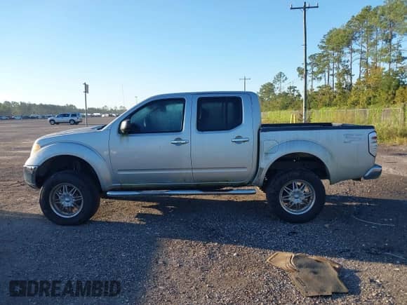2008 Nissan Frontier SE with VIN 1N6AD07W78C429498, listed as a IAAI auction lot 43451584 with 237,318 mi miles and . Bid and sale history available at DreamBid. Image 14.