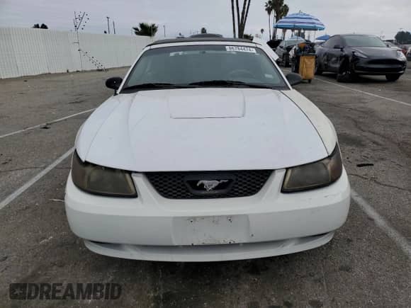 2004 Ford Mustang Deluxe с VIN 1FAFP44454F123067, выставлен на аукционе Copart как лот 86784474 с пробегом 161 541 миль миль и Списание • Salvage title. История ставок и продаж доступна на DreamBid. Изображение 5.