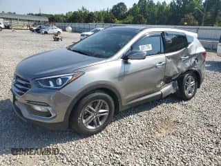 2018 Hyundai Santa Fe 2.4L with VIN 5NMZUDLB5JH065525, listed as a Copart auction lot 68917795 with Not provided miles and Salvage title. Bid and sale history available at DreamBid. Image 1.