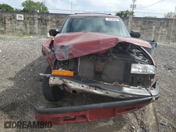 1999 Chevrolet Blazer LS z VIN 1GNCS13W2X2156012, wystawiony jako Copart lot #79730344 z przebiegiem 142 788 mil mil oraz Szkoda całkowita • Salvage title. Historia ofert i sprzedaży dostępna na DreamBid. Obrazek 5.