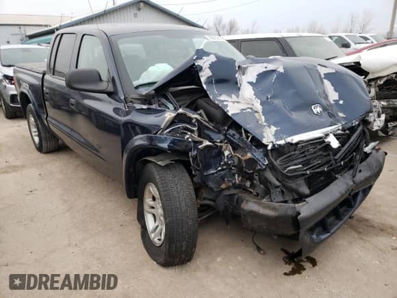 2004 Dodge Dakota Sport z VIN 1D7HL38N84S700019, wystawiony jako Copart lot #49158204 z przebiegiem 95 636 mil mil oraz Szkoda całkowita • Salvage title. Historia ofert i sprzedaży dostępna na DreamBid. Obrazek 4.