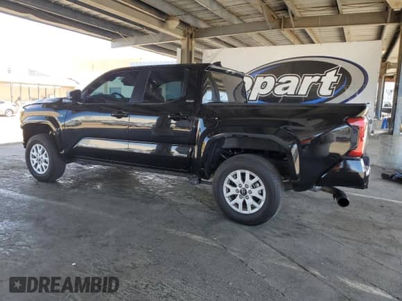 2024 Toyota Tacoma SR5 with VIN 3TMKB5FN9RM023449, listed as a Copart auction lot 67866095 with 5,550 mi miles and Salvage title. Bid and sale history available at DreamBid. Image 2.
