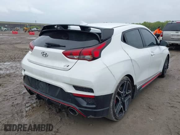 2021 Hyundai Veloster z VIN KMHT36AH3MU009877, wystawiony jako IAAI lot #42209546 z przebiegiem Nie podano mil oraz . Historia ofert i sprzedaży dostępna na DreamBid. Obrazek 4.