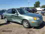 2004 Hyundai Accent GL z VIN KMHCG45C24U503929, wystawiony jako Copart lot #71820915 z przebiegiem 146 643 mil mil oraz Szkoda całkowita • Salvage title. Historia ofert i sprzedaży dostępna na DreamBid. Obrazek 4.