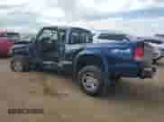 2004 Dodge Dakota z VIN 1D7HG12K24S677070, wystawiony jako Copart lot #60228055 z przebiegiem 176 990 mil mil oraz Szkoda całkowita • Salvage title. Historia ofert i sprzedaży dostępna na DreamBid. Obrazek 2.