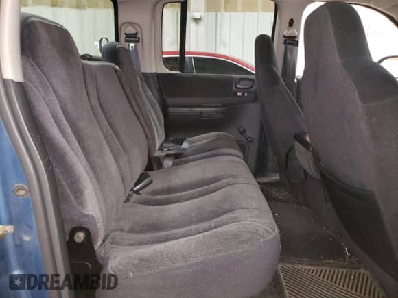 2003 Dodge Dakota Sport z VIN 1D7HG38X33S149289, wystawiony jako Copart lot #72442394 z przebiegiem 164 177 mil mil oraz Czysty tytuł • Clean title. Historia ofert i sprzedaży dostępna na DreamBid. Obrazek 10.