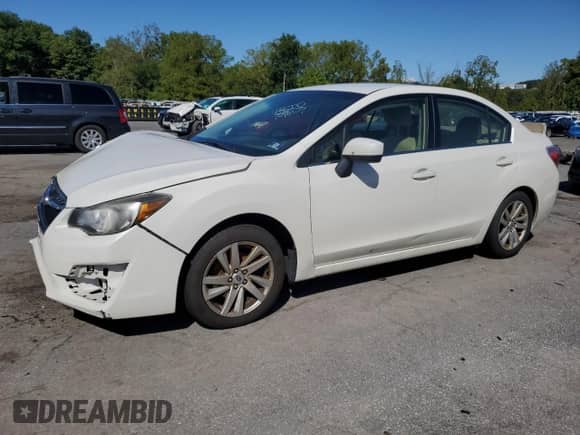 2016 Subaru Impreza Premium with VIN JF1GJAB62GH011411, listed as a Copart auction lot 71812795 with 136,830 mi miles and Salvage title. Bid and sale history available at DreamBid. Image 1.