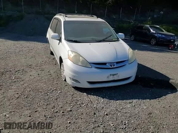 2010 Toyota Sienna XLE с VIN 5TDDK4CC8AS031049, выставлен на аукционе Copart как лот 80094555 с пробегом 200 309 миль миль и Списание • Salvage title. История ставок и продаж доступна на DreamBid. Изображение 14.