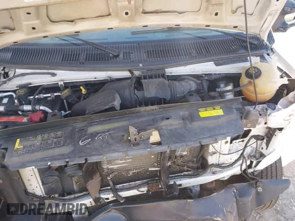 2014 Ford Econoline Cargo Commercial with VIN 1FTNE2EL7EDB02479, listed as a IAAI auction lot 42178687 with 200,019 mi miles and . Bid and sale history available at DreamBid. Image 10.